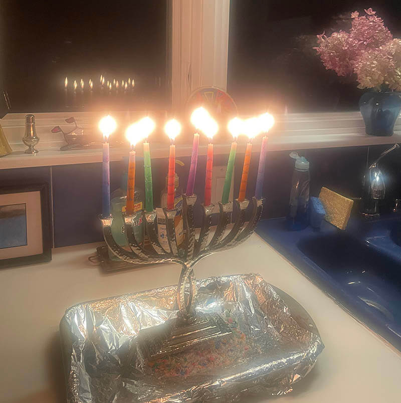 Lit Menorah candles